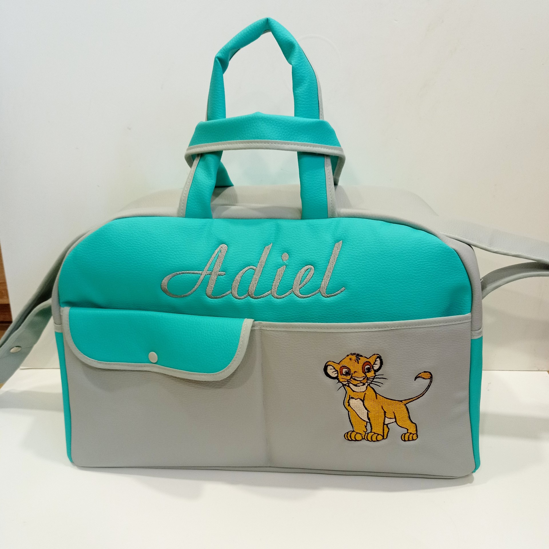 Bolso Maternal gris / turquesa simba